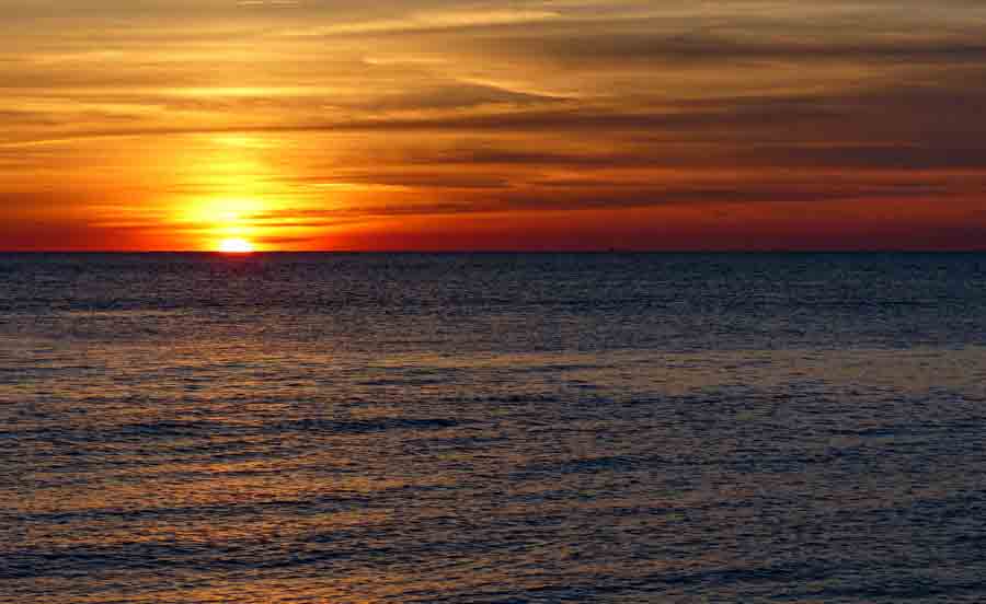 a beach at sunset